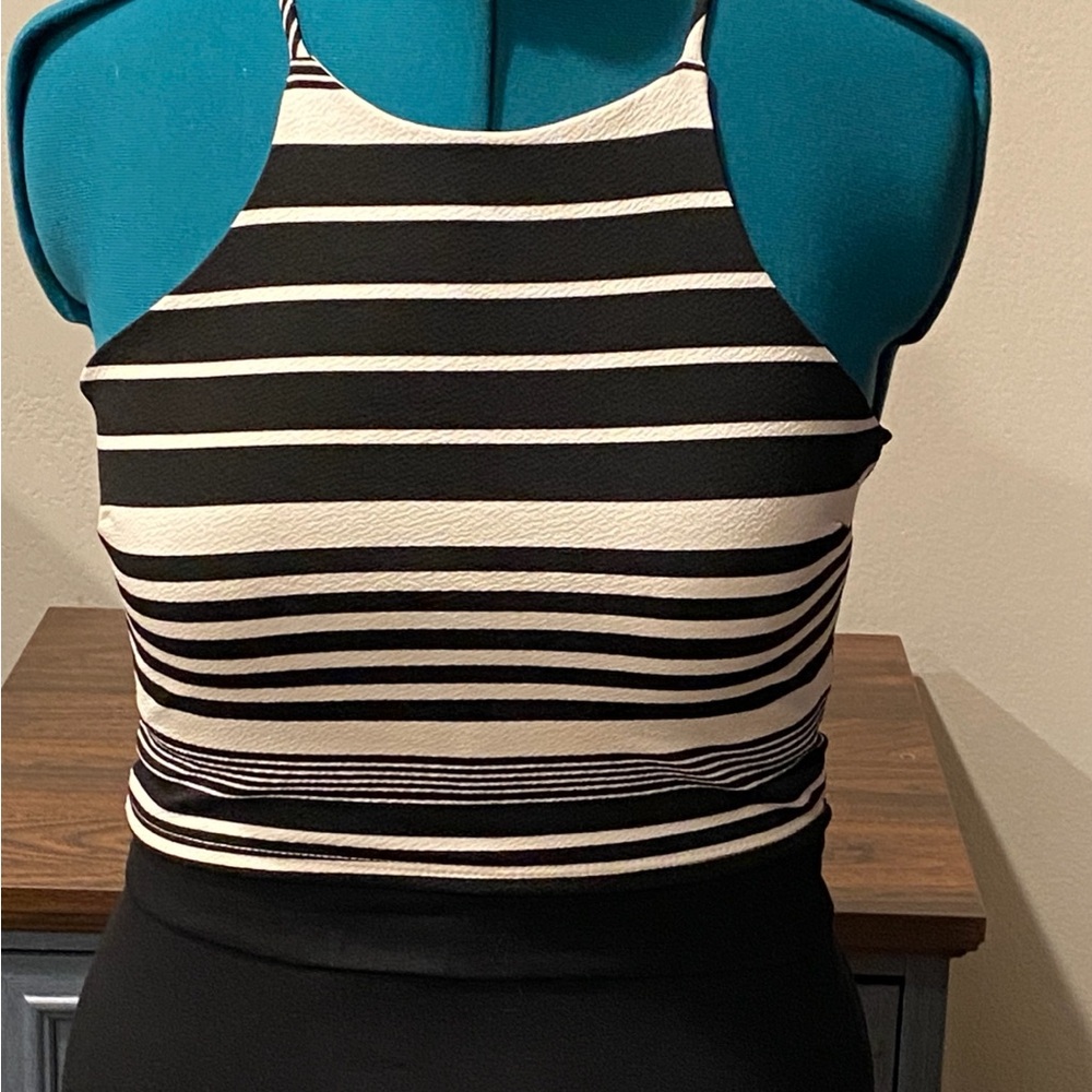 Juniors black and white striped crop top. New with tags, size Medium.